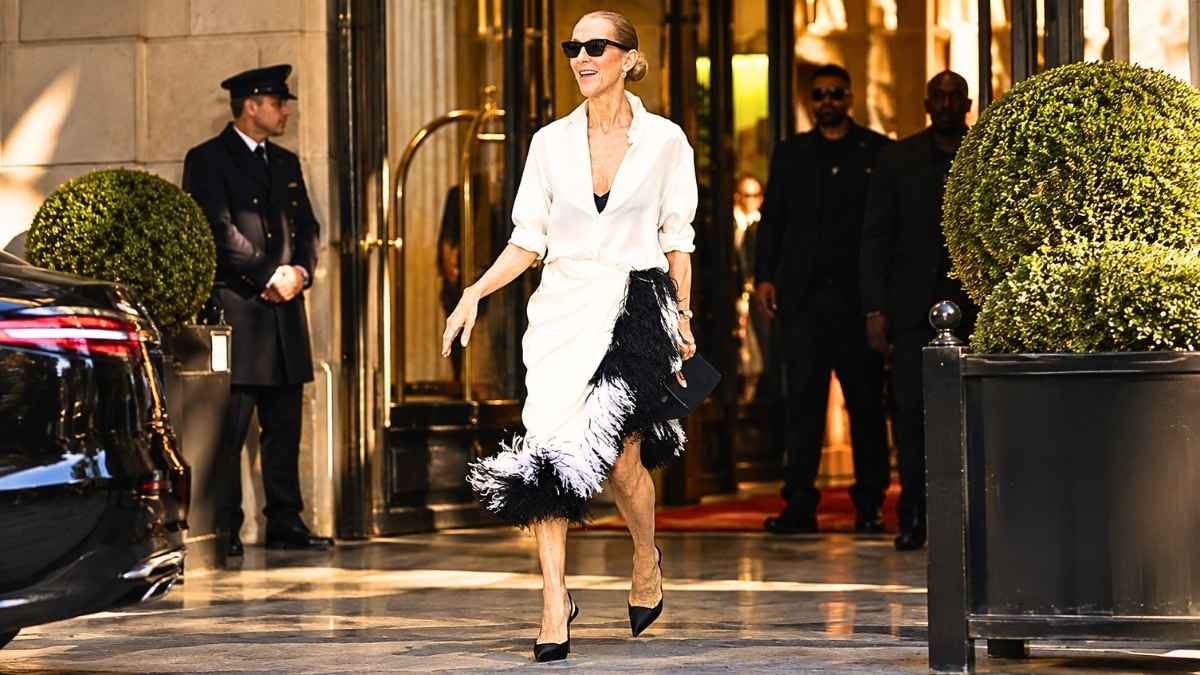 Celine-Boutique DIOR Paris Royale-cecile-Dion-sublime-en-jupe-Dior-a-plumes-noires-et-blanches-devant-le-Royal-Monceau-a-Paris.jpg